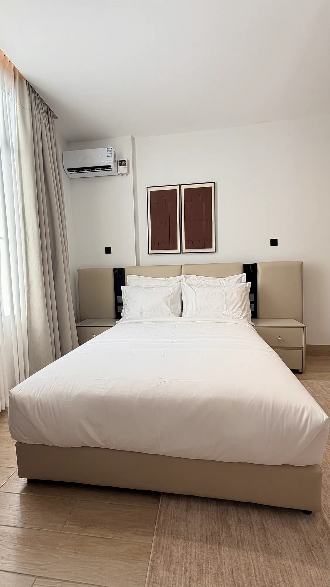 Suite bedroom dressed in white linen
