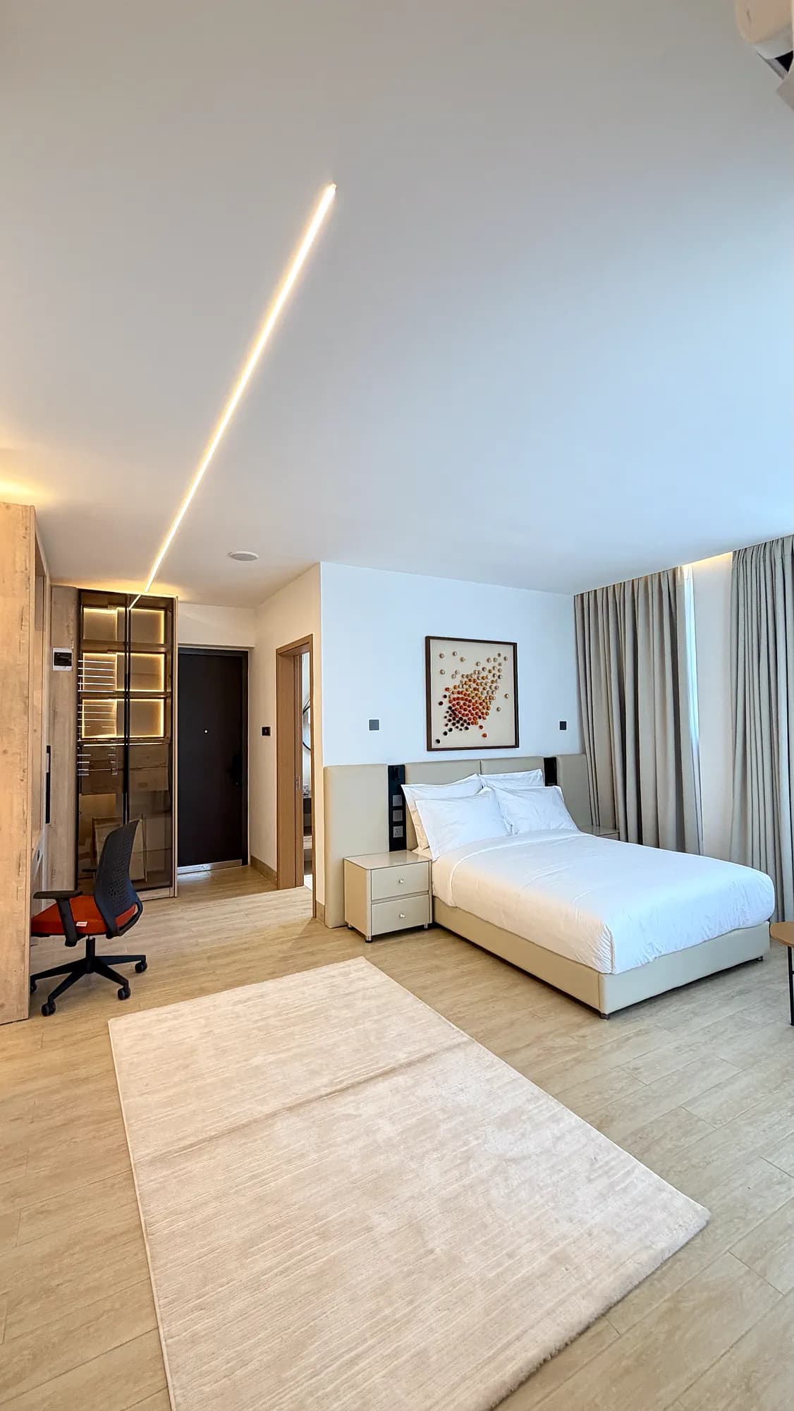 1BHK Suite writing desk and wardrobe run, Kigo Kampala